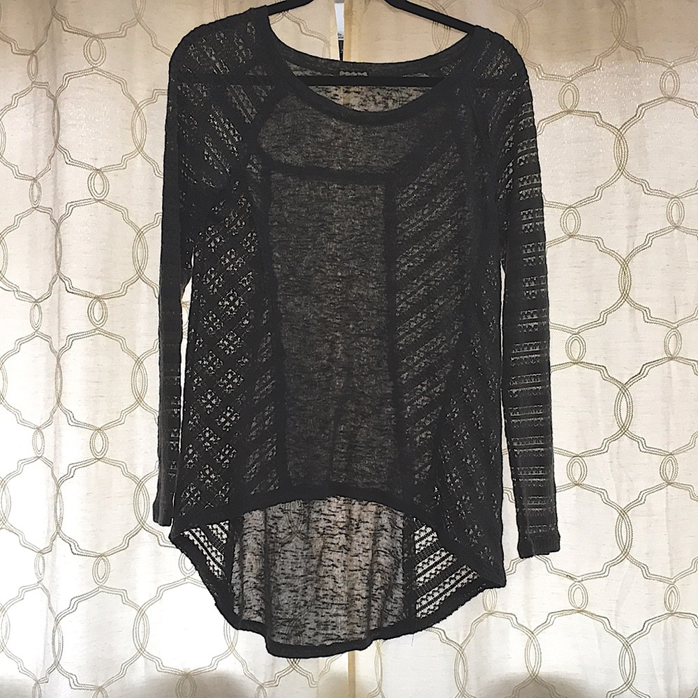 See through simple sweater, grey and medium sized.